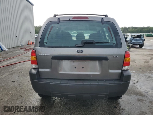 2006 Ford Escape XLS with VIN 1FMYU02Z66KA18952, listed as a Copart auction lot 60472305 with 221,258 mi miles and Salvage title. Bid and sale history available at DreamBid. Image 6.