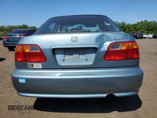 2000 Honda Civic VP z VIN 2HGEJ6615YH570557, wystawiony jako Copart lot #59337105 z przebiegiem 120 163 mil mil oraz Szkoda całkowita • Salvage title. Historia ofert i sprzedaży dostępna na DreamBid. Obrazek 6.