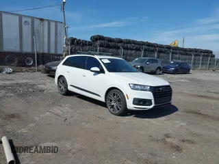 2019 Audi Q7 Prestige with VIN WA1VAAF77KD042653, listed as a IAAI auction lot 42094332 with 73,489 mi miles and . Bid and sale history available at DreamBid. Image 1.