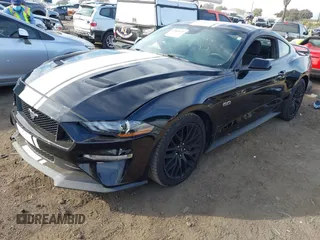 2021 Ford Mustang GT with VIN 1FA6P8CF5M5133808, listed as a IAAI auction lot 41500470 with 43,952 mi miles. Bid and sale history available at carsss.com. Image 2.