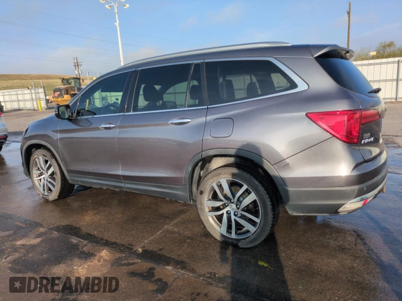 2017 Honda Pilot Touring with VIN 5FNYF6H95HB083610, listed as a Copart auction lot 50806045 with 200,897 mi miles and Salvage Title. Bid and sale history available at DreamBid. Image 2.
