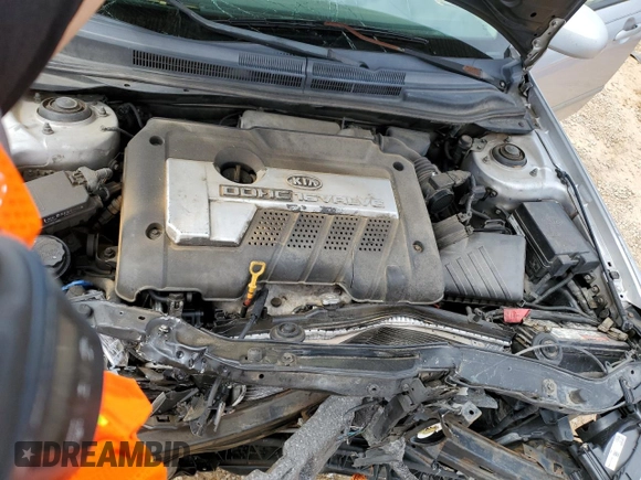 2005 Kia Spectra LX with VIN KNAFE121255202207, listed as a Copart auction lot 47648205 with 0 mi miles and Salvage Title. Bid and sale history available at carsss.com. Image 12.