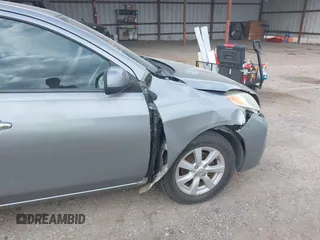 2013 Nissan Versa SV with VIN 3N1CN7AP2DL822216, listed as a IAAI auction lot 41667978 with 194,281 mi miles and . Bid and sale history available at DreamBid. Image 13.