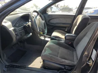 1999 Nissan Maxima GXE z VIN JN1CA21D9XM409448, wystawiony jako Copart lot #51822895 z przebiegiem Nie podano mil oraz Szkoda całkowita • Salvage title. Historia ofert i sprzedaży dostępna na DreamBid. Obrazek 7.