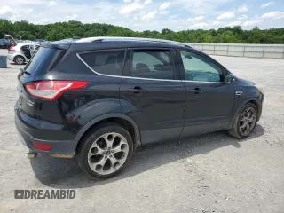 2014 Ford Escape Titanium с VIN 1FMCU0J9XEUA27152, выставлен на аукционе Copart как лот 60246715 с пробегом 182 550 миль миль и Чистый • Clean title. История ставок и продаж доступна на DreamBid. Изображение 3.