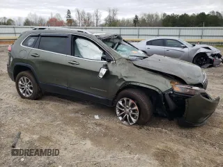 2021 Jeep Cherokee Latitude Lux with VIN 1C4PJMMX8MD110383, listed as a Copart auction lot 50702295 with 67,941 mi miles and Salvage Title. Bid and sale history available at DreamBid. Image 4.