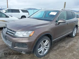 2013 Volkswagen Touareg Lux with VIN WVGEF9BP1DD012851, listed as a IAAI auction lot 41732391 with 123,283 mi miles and . Bid and sale history available at DreamBid. Image 18.