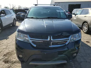 2013 Dodge Journey Crew with VIN 3C4PDCDG4DT588442, listed as a Copart auction lot 51350775 with 151,172 mi miles and Salvage title. Bid and sale history available at DreamBid. Image 5.