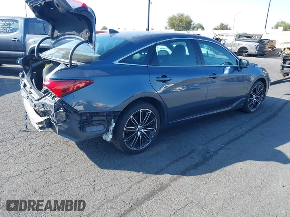 2019 Toyota Avalon XLE z VIN 4T1BZ1FB5KU030812, wystawiony jako IAAI lot #41498998 z przebiegiem 31 986 mil mil oraz . Historia ofert i sprzedaży dostępna na DreamBid. Obrazek 4.
