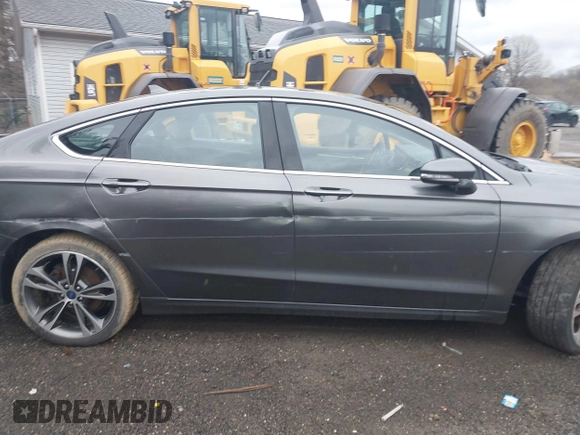 2019 Ford Fusion Titanium with VIN 3FA6P0D93KR124299, listed as a IAAI auction lot 40182478 with 73,408 mi miles. Bid and sale history available at carsss.com. Image 14.