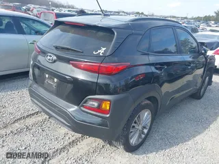 2021 Hyundai Kona SEL with VIN KM8K22AA1MU605029, listed as a IAAI auction lot 41478328 with 57,429 mi miles. Bid and sale history available at carsss.com. Image 4.
