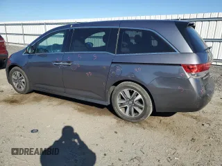 2014 Honda Odyssey Touring with VIN 5FNRL5H96EB061876, listed as a Copart auction lot 49759935 with 132,591 mi miles and Salvage Title. Bid and sale history available at DreamBid. Image 2.