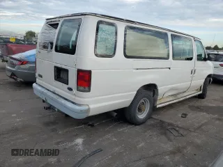 1999 Ford Econoline Passenger XL with VIN 1FBSS31L2XHA95612, listed as a Copart auction lot 72615104 with 211,283 mi miles and Salvage Title. Bid and sale history available at DreamBid. Image 3.