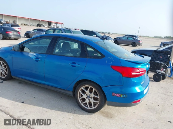 2015 Ford Focus SE with VIN 1FADP3F21FL326927, listed as a IAAI auction lot 42628577 with 112,199 mi miles and . Bid and sale history available at DreamBid. Image 3.