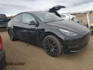 2022 Tesla Model Y Performance with VIN 7SAYGDEF3NF546385, listed as a Copart auction lot 83784984 with 30,769 mi miles and Salvage Title. Bid and sale history available at DreamBid. Image 4.