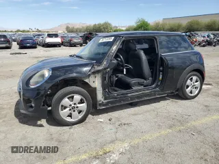 2019 MINI Hardtop Cooper with VIN WMWXP5C5XK2H29936, listed as a Copart auction lot 56713285 with 80,303 mi miles and Salvage title. Bid and sale history available at DreamBid. Image 1.