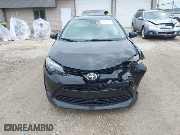 2018 Toyota Corolla L with VIN 2T1BURHE8JC113915, listed as a IAAI auction lot 42370963 with 190,563 mi miles and . Bid and sale history available at DreamBid. Image 13.