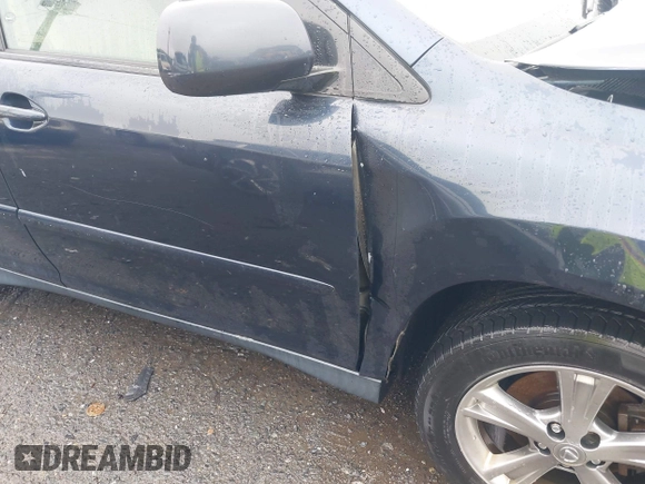 2006 Lexus RX 400h z VIN JTJHW31U360017966, wystawiony jako IAAI lot #42259691 z przebiegiem 197 947 mil mil oraz . Historia ofert i sprzedaży dostępna na DreamBid. Obrazek 17.