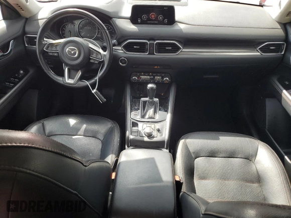 2019 Mazda CX-5 Grand Touring with VIN JM3KFADM2K1657915, listed as a Copart auction lot 56647145 with 85,095 mi miles and Salvage title. Bid and sale history available at DreamBid. Image 8.
