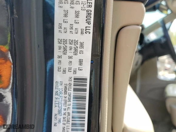 2014 Jeep Grand Cherokee Overland with VIN 1C4RJFCT1EC379867, listed as a Copart auction lot 54106375 with 217,908 mi miles and Clean Title. Bid and sale history available at carsss.com. Image 13.