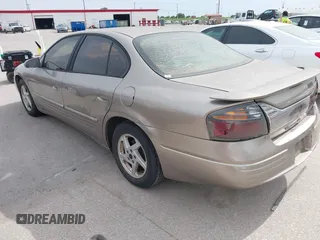 2004 Pontiac Bonneville SE z VIN 1G2HX52K04U248925, wystawiony jako IAAI lot #42072378 z przebiegiem 192 653 mil mil oraz . Historia ofert i sprzedaży dostępna na DreamBid. Obrazek 3.