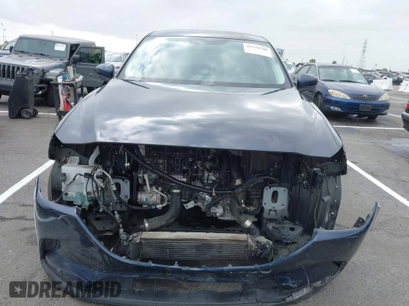 2016 Mazda CX-9 Sport with VIN JM3TCABY3G0123239, listed as a IAAI auction lot 42570700 with 119,414 mi miles and . Bid and sale history available at DreamBid. Image 13.