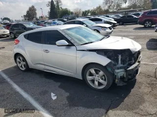 2014 Hyundai Veloster with VIN KMHTC6AD2EU186726, listed as a Copart auction lot 43993215 with 120,591 mi miles and Salvage Title. Bid and sale history available at carsss.com. Image 4.