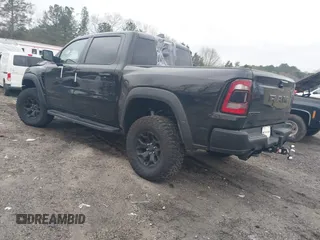 2022 Ram 1500 TRX with VIN 1C6SRFU9XNN476106, listed as a IAAI auction lot 41627895 with 21,992 mi miles and . Bid and sale history available at DreamBid. Image 3.