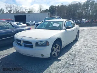 2009 Dodge Charger SXT with VIN 2B3KA33V19H593666, listed as a IAAI auction lot 41573349 with 239,264 mi miles. Bid and sale history available at carsss.com. Image 2.