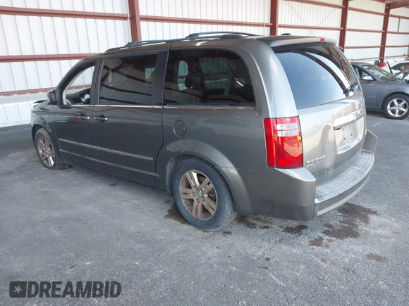 2010 Dodge Grand Caravan SXT with VIN 2D4RN5DX6AR316624, listed as a IAAI auction lot 41943314 with 132,563 mi miles and . Bid and sale history available at DreamBid. Image 3.
