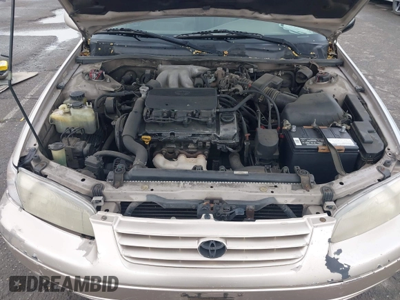 1997 Toyota Camry LE z VIN 4T1BF22K8VU916373, wystawiony jako IAAI lot #41915751 z przebiegiem 259 818 mil mil oraz . Historia ofert i sprzedaży dostępna na DreamBid. Obrazek 10.