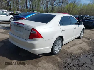 2012 Ford Fusion Hybrid с VIN 3FADP0L31CR325835, выставлен на аукционе IAAI как лот 41982489 с пробегом 124 266 миль миль и . История ставок и продаж доступна на DreamBid. Изображение 4.