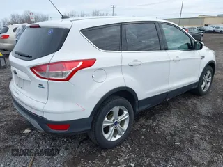 2014 Ford Escape SE z VIN 1FMCU9GX6EUE32418, wystawiony jako IAAI lot #42022304 z przebiegiem 100 216 mil mil oraz . Historia ofert i sprzedaży dostępna na DreamBid. Obrazek 4.