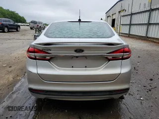 2018 Ford Fusion S z VIN 3FA6P0G71JR222742, wystawiony jako Copart lot #54545715 z przebiegiem 219 261 mil mil oraz Szkoda całkowita • Salvage title. Historia ofert i sprzedaży dostępna na DreamBid. Obrazek 6.