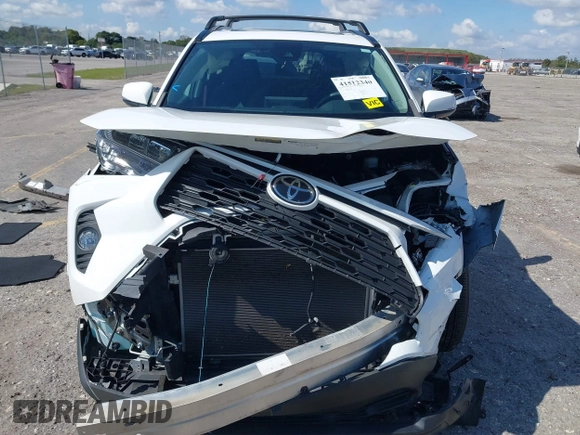 2021 Toyota RAV4 XLE with VIN 2T3W1RFV2MC102997, listed as a IAAI auction lot 41512340 with 47,238 mi miles. Bid and sale history available at carsss.com. Image 13.