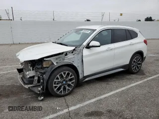 2021 BMW X1 xDrive28i с VIN WBXJG9C09M5U35093, выставлен на аукционе Copart как лот 65509155 с пробегом 46 875 миль миль и Списание • Salvage title. История ставок и продаж доступна на DreamBid. Изображение 1.