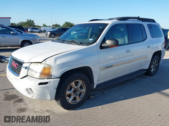 2003 GMC Envoy SLT with VIN 1GKES16S436243654, listed as a IAAI auction lot 42186690 with 125,315 mi miles and . Bid and sale history available at DreamBid. Image 2.