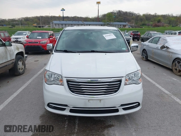 2015 Chrysler Town & Country Touring-L with VIN 2C4RC1CG9FR573863, listed as a IAAI auction lot 42036034 with 141,390 mi miles. Bid and sale history available at carsss.com. Image 12.