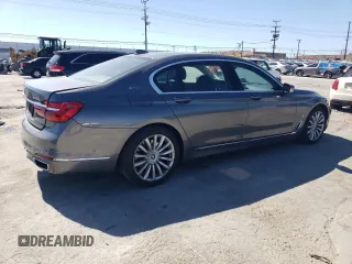 2018 BMW 7 Series 740e xDrive with VIN WBA7J2C55JG938385, listed as a Copart auction lot 49109985 with 81,567 mi miles and Salvage Title. Bid and sale history available at DreamBid. Image 3.