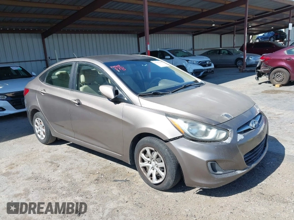 2014 Hyundai Accent GLS z VIN KMHCT4AE9EU671748, wystawiony jako IAAI lot #42356469 z przebiegiem 179 390 mil mil oraz . Historia ofert i sprzedaży dostępna na DreamBid. Obrazek 1.