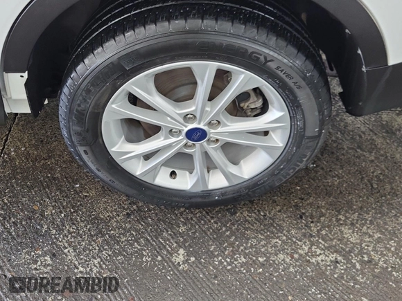 2017 Ford Escape SE z VIN 1FMCU0GD4HUB05330, wystawiony jako IAAI lot #42396863 z przebiegiem 66 420 mil mil oraz . Historia ofert i sprzedaży dostępna na DreamBid. Obrazek 6.
