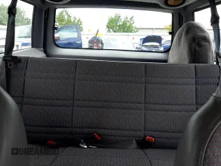 1998 Jeep Cherokee SE with VIN 1J4FT28S8WL219020, listed as a Copart auction lot 67757004 with 217,715 mi miles and Salvage Title. Bid and sale history available at carsss.com. Image 10.