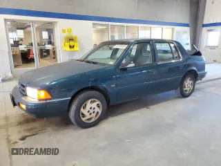 1994 Dodge Spirit Highline z VIN 1B3AA4636RF148742, wystawiony jako Copart lot #45249505 z przebiegiem 89 040 mil mil oraz Szkody całkowita. Historia ofert i sprzedaży dostępna na DreamBid. Obrazek 1.