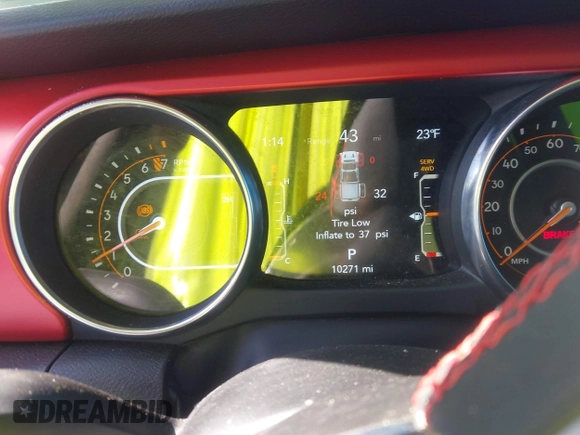 2023 Jeep Gladiator Rubicon with VIN 1C6JJTBG6PL576818, listed as a IAAI auction lot 41515428 with 10,271 mi miles and . Bid and sale history available at DreamBid. Image 7.