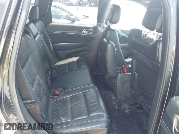 2014 Jeep Grand Cherokee Limited with VIN 1C4RJFBTXEC140898, listed as a IAAI auction lot 42793097 with 159,542 mi miles and . Bid and sale history available at DreamBid. Image 8.
