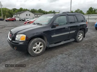 2004 GMC Envoy SLT with VIN 1GKDT13S842210243, listed as a Copart auction lot 55672595 with 148,232 mi miles and Clean Title. Bid and sale history available at DreamBid. Image 1.
