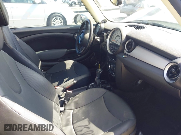 2011 MINI Hardtop with VIN WMWSU3C52BT095133, listed as a IAAI auction lot 42249436 with 44,652 mi miles and . Bid and sale history available at DreamBid. Image 5.