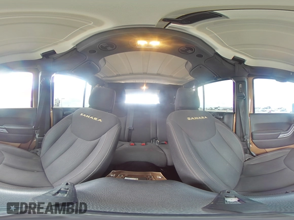 2015 Jeep Wrangler Unlimited Sahara z VIN 1C4BJWEG5FL645846, wystawiony jako Copart lot #53326855 z przebiegiem 122 510 mil mil oraz Szkoda całkowita • Salvage title. Historia ofert i sprzedaży dostępna na DreamBid. Obrazek 13.
