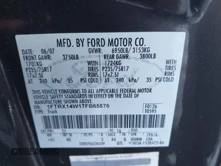 2007 Ford F-150 STX with VIN 1FTRX14W17FB65876, listed as a IAAI auction lot 41318821 with 206,254 mi miles. Bid and sale history available at carsss.com. Image 9.