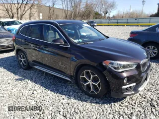 2016 BMW X1 xDrive28i z VIN WBXHT3C3XGP888701, wystawiony jako Copart lot #51409205 z przebiegiem 94 713 mil mil oraz Szkoda całkowita • Salvage title. Historia ofert i sprzedaży dostępna na DreamBid. Obrazek 4.